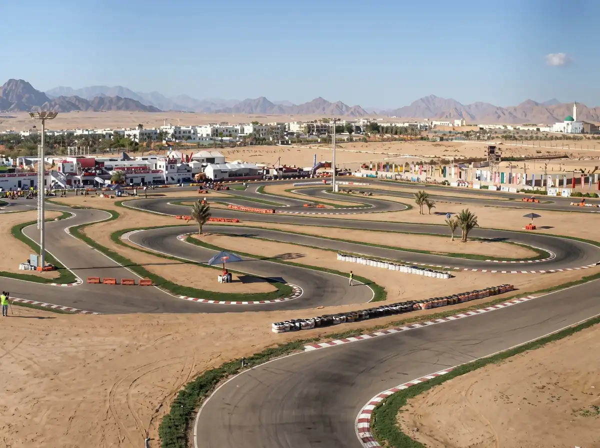 Aerial view of the go-kart track, with mountains behind