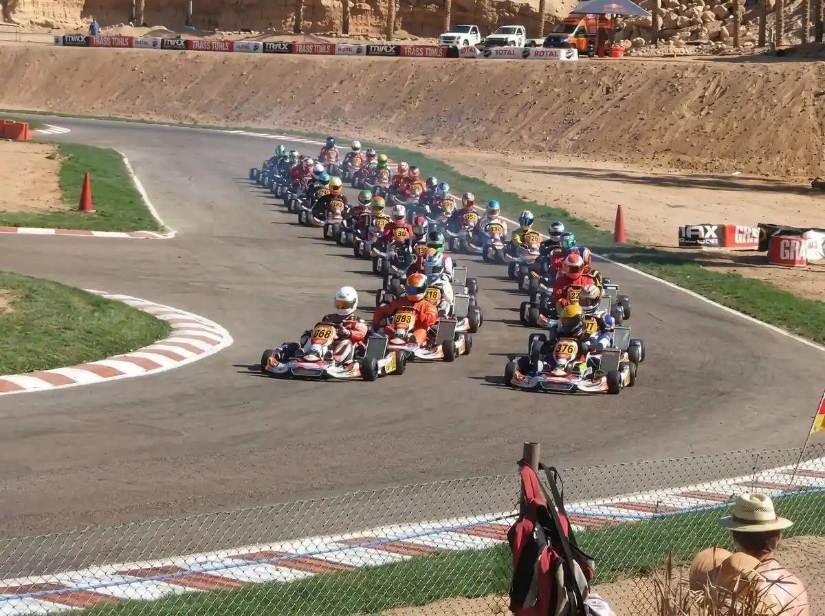 A pack of go-karts taking a bend