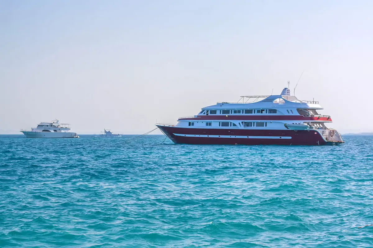 Yachts at anchor on turquoise water